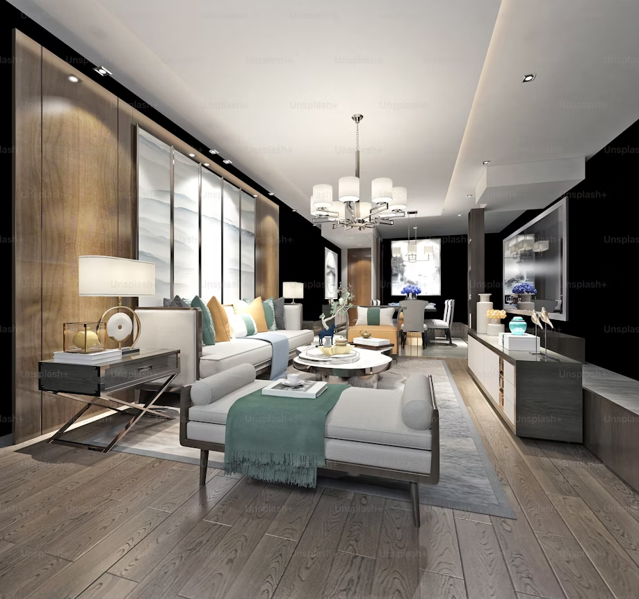 A Stylish modern living room with cozy seating, wooden floors, and elegant lighting.